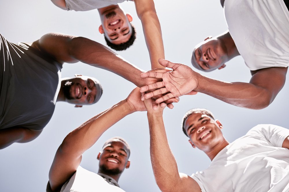 portrait of diverse group of sporty men from below 722p5m8.jpg